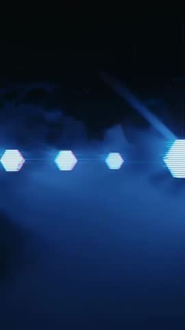 Vertical Neon Hex Pulse Loop - Flickering Blue Hexagons Forming Signal Beam for SciFi Branding