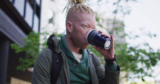 Urban Professional Man Enjoying Coffee Outdoors - Download Free Stock Images Pikwizard.com