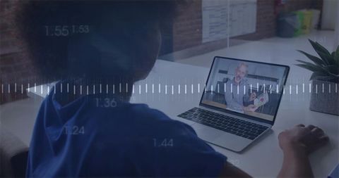 Woman watching remote presentation on laptop with audio waveform overlay and modern office