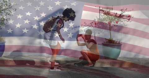 Young women skateboarding on sidewalk filming with smartphone and american flag overlay