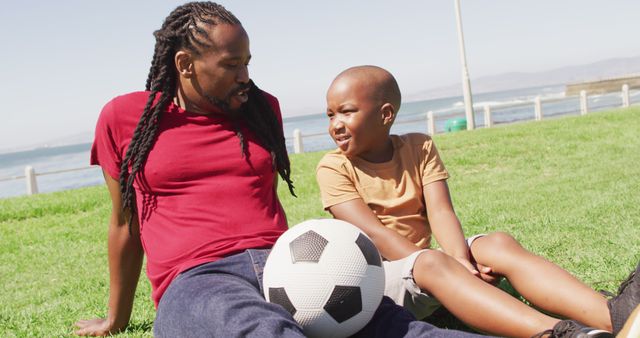 Father and Son Bonding at Park with Soccer Ball - Download Free Stock Images Pikwizard.com