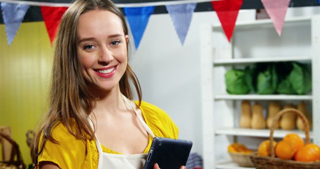 Smiling Woman Holding Tablet in Farmers Market - Download Free Stock Images Pikwizard.com