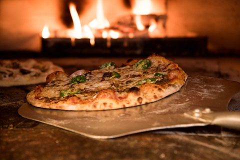 Wood-Fired Pizza Freshly Baked in Traditional Oven