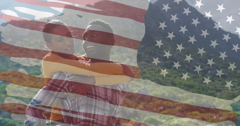 Smiling Diverse Couple Embracing in American Flag Overlay