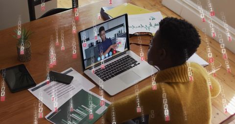 African American Woman on Video Call with Digital Binary Overlay