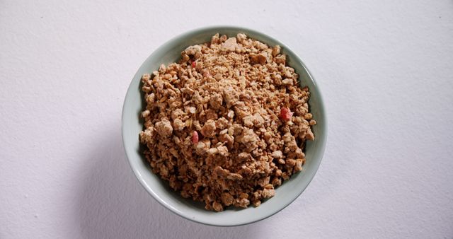 Healthy Granola in Green Bowl on White Background - Download Free Stock Images Pikwizard.com