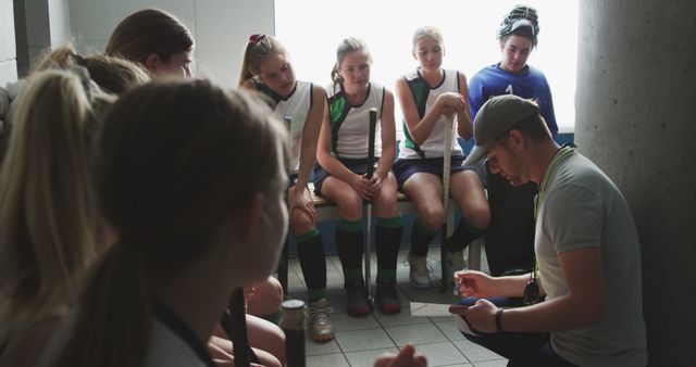 Coach Giving Strategy to Girls' Field Hockey Team During Halftime - Download Free Stock Images Pikwizard.com