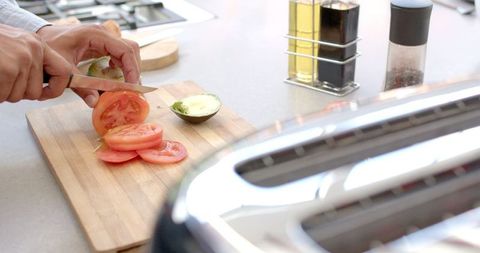 Preparing Fresh Ingredients in a Modern Kitchen Setting