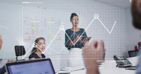 Businesswoman Presenting Digital Graph Concept