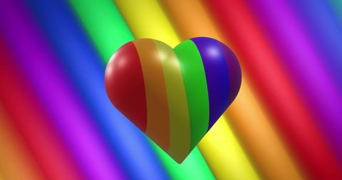 3d rainbow heart on vivid rainbow background symbolizing lgbt pride