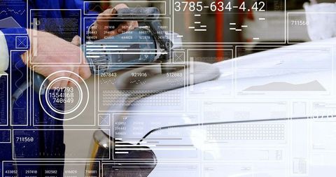 Auto body technician sanding white car panel with orbital sander and futuristic hud overlays