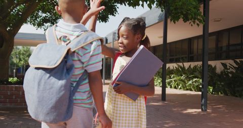 African American Children High-Fiving Outside School - Download Free Stock Images Pikwizard.com