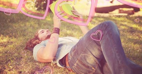 Man enjoying leisure reading outdoors among nature's beauty