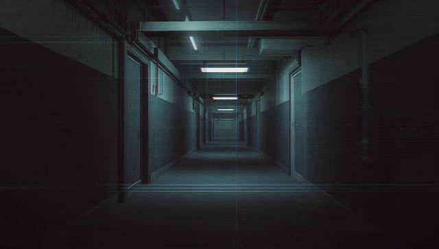 Receding Underground Corridor Featuring Fluorescent Lighting, Exposed Pipes