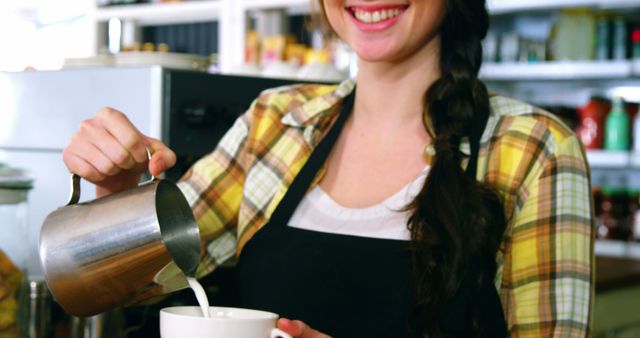 Smiling Barista Pouring Milk for Coffee in Cafe - Download Free Stock Images Pikwizard.com