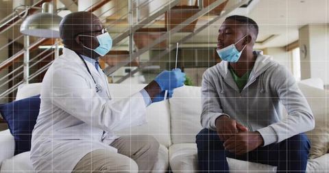 Doctor administering nasal swab test to patient in home setting
