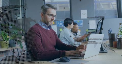 Focused Professional Working in Modern Office with Technology