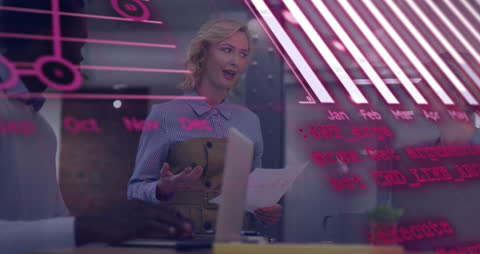 Multi-Ethnic Team Analyzing Data Insights With Digital Interface