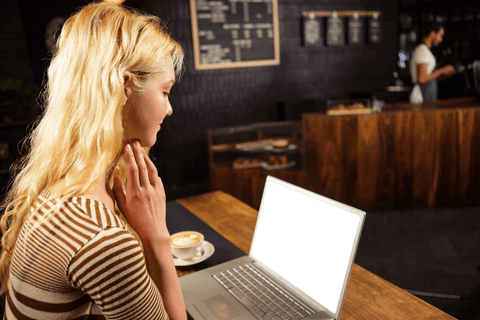 young woman at coffee shop viewing transparent laptop screen - Download Free Stock Videos Pikwizard.com