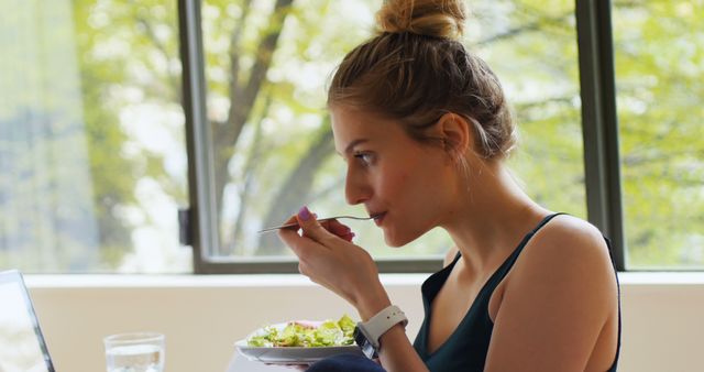 Young Woman Eating Healthy Breakfast in Bright Room - Download Free Stock Images Pikwizard.com