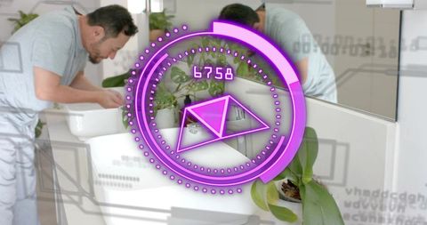 Middle-aged man washing face at contemporary bathroom vanity leaning into mirror with orchid and pur