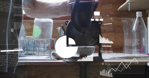 Man turning cast iron grinder with rolled sleeve forearm in rustic wooden kitchen, data hud overlay