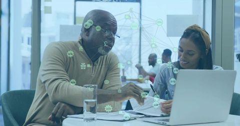 Professional Collaboration in Modern Open-Plan Workspace