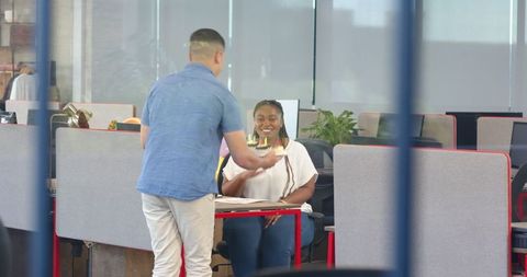 Happy Birthday Celebration Between Colleagues in Office