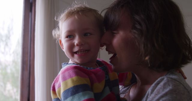 Mother and Child Smiling Together at Home - Download Free Stock Images Pikwizard.com