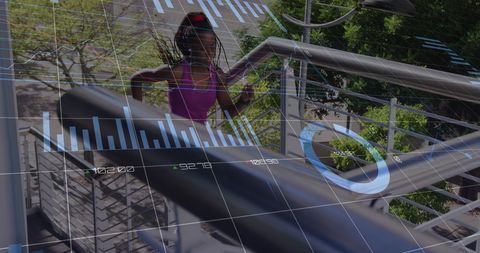 African American Woman Running Stairs Overlayed with Digital Interface
