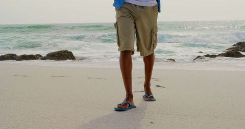 Casual Walk on Beach with Ocean Waves - Download Free Stock Images Pikwizard.com