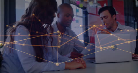 Diverse Team Collaborating in Modern Office with Network Overlay