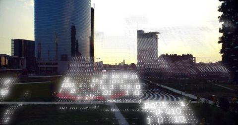 Augmented reality binary projection over urban plaza and amphitheater at sunset with glass tower