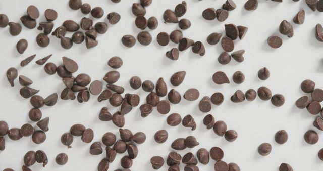 Overhead View of Chocolate Chips on White Background – Fusion Food and Sweets Concept - Download Free Stock Images Pikwizard.com