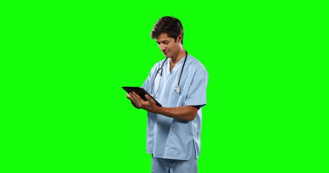 Healthcare Professional Using Digital Tablet On Green Screen Background - Download Free Stock Images Pikwizard.com