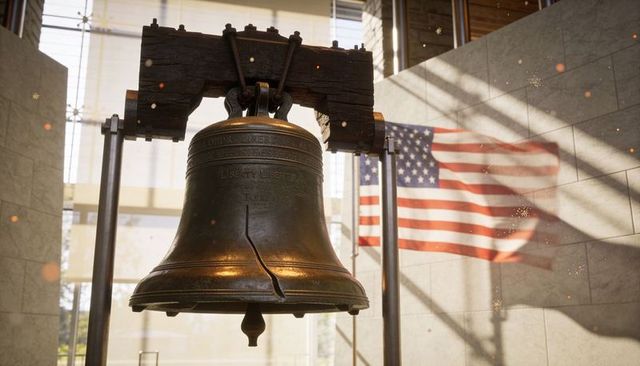 Historic cracked liberty bell on wooden yoke with american flag in sunlit gallery