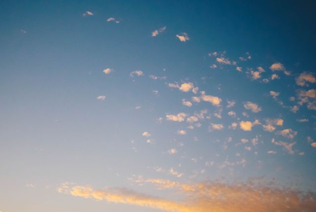 Beautiful Sunset Sky with Light Clouds - Download Free Stock Photos Pikwizard.com