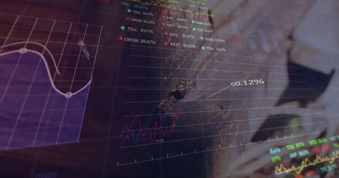 Analyzing stock data with digital charts in modern office