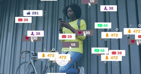 African American Woman Engaging on Social Media in Urban Setting