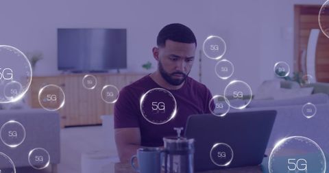Man Working Online with 5G Network Symbols Real Imagery