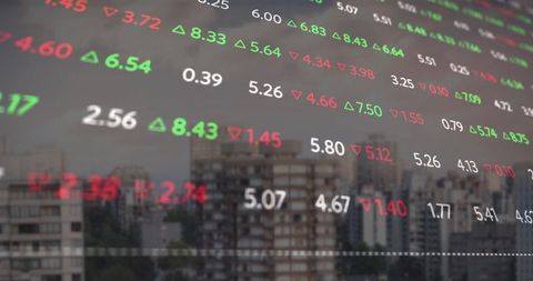 Transparent stock ticker overlay reflecting urban skyline with green red market indicators
