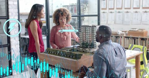 Diverse architects collaborating on building model with digital interface