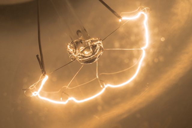 Close-Up of a Glowing Tungsten Filament - Download Free Stock Photos Pikwizard.com