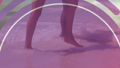 Couple Walking by Beach with Italian Flag Overlay