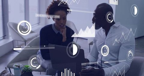 Collaborating on analytics dashboard reviewing charts, graphs and performance metrics