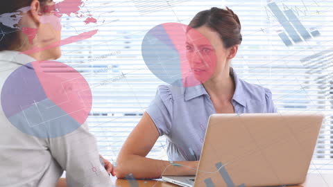 Women Analyzing Financial Data on Laptop with Graphical Overlays