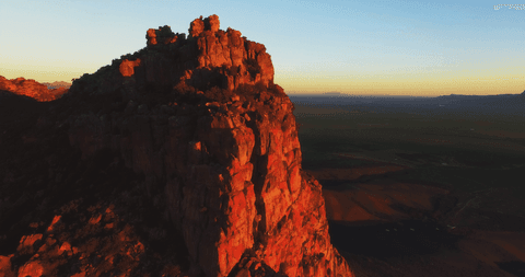 transparent sunset over majestic rocky mountain top - Download Free Stock Videos Pikwizard.com