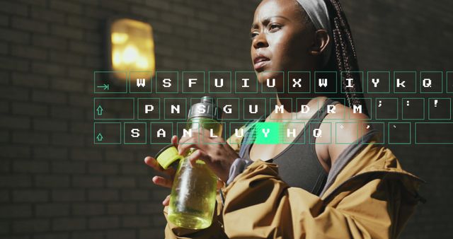 Woman Holding Water Bottle with Futuristic Typographic Overlay - Download Free Stock Images Pikwizard.com