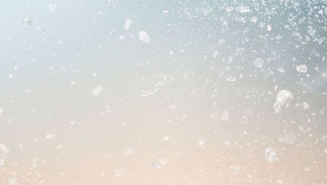 Translucent particles drifting over pastel gradient backdrop with soft grain texture
