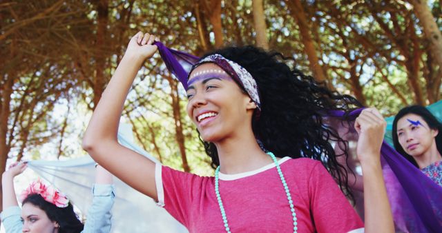 Young Woman Enjoying Festival Spirit in Nature - Download Free Stock Images Pikwizard.com